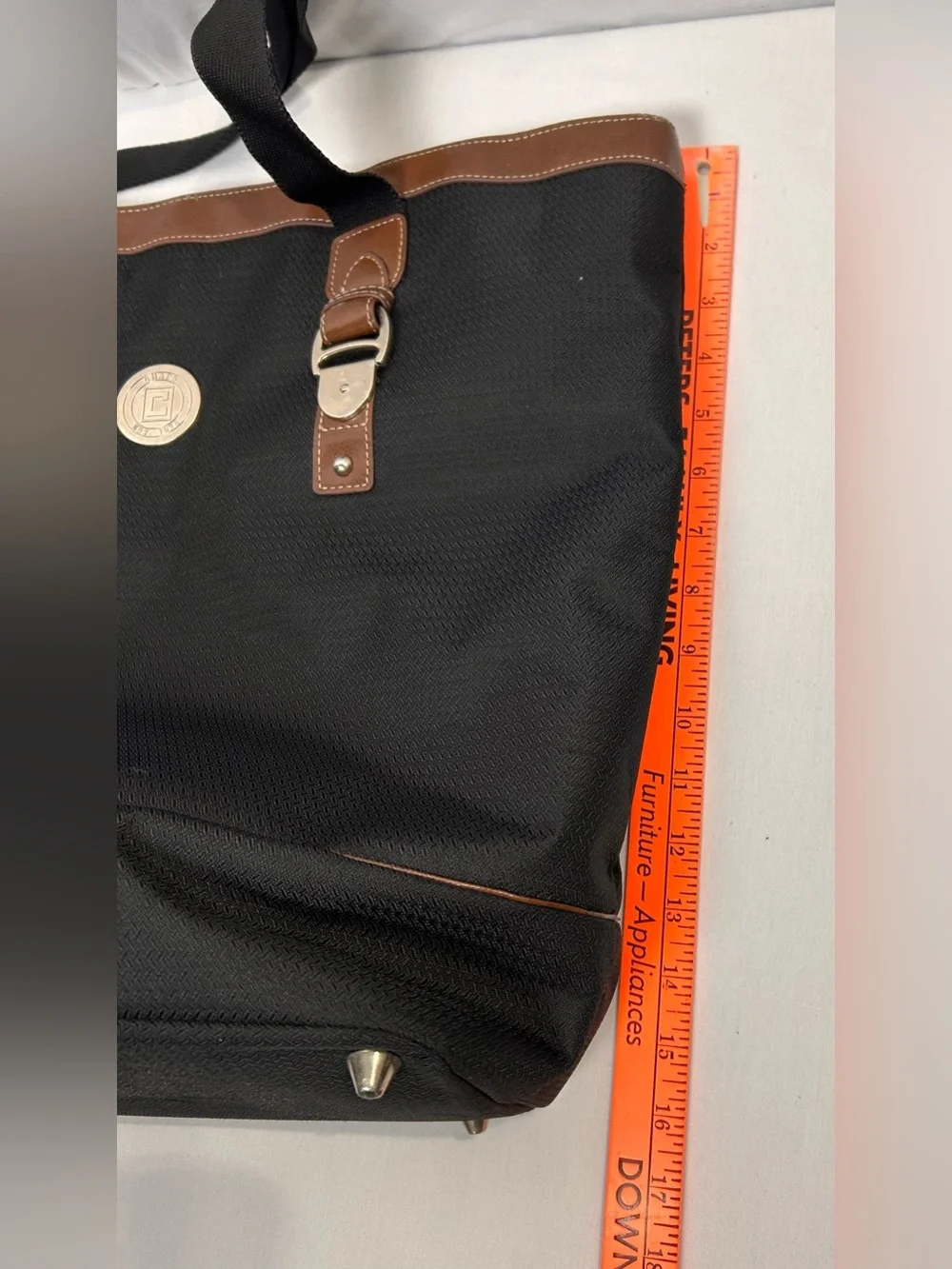 Chaps Black Tote with Brown Trim and Silver Buckle Details
